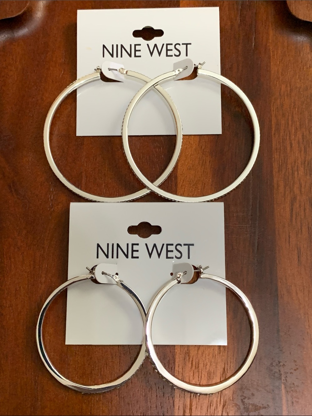 NWT Nine West 2 pair set of silver tone clear stone hoop earrings